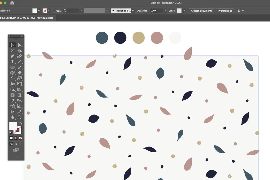 Pantalla del programa de Illustrator con una composición de un estampado de hojas en colores azules, ocre, rosa y crudo.