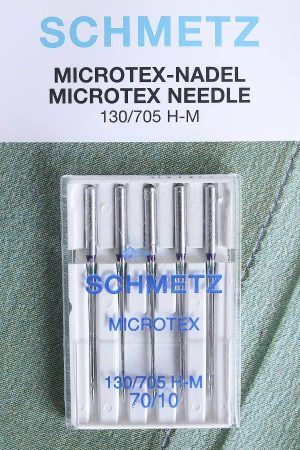 Blister blanco, con tapa transparente, de 5 agujas Microtex de grosor 70 de Schmetz.