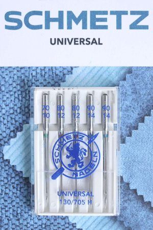 Blister blanco, con tapa transparente, de 5 agujas Universal de Schmetz. En la caja se indican los diferentes grosores de aguja: 70, 80 y 90.
