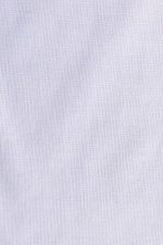 Detalle del entramado del tejido de una entretela termoadhesiva de color blanco. Se aprecia un ligero brillo que corresponde al pegamento.