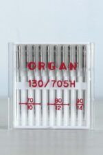 Cajita blanca con surtido de 10 agujas de coser a máquina universales. En la caja se puede leer en rojo la marca, ORGAN, y los grosores de la aguja: 70, 80 y 90.