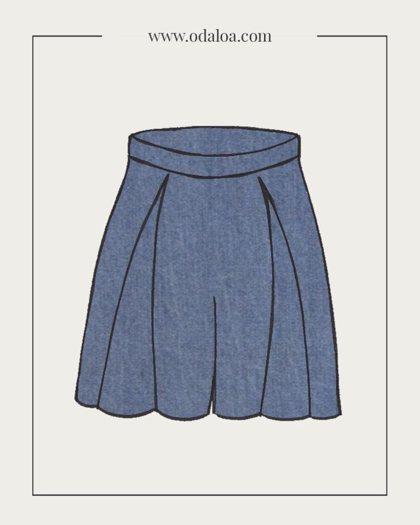Dibujo de pantalón culotte, con una largura a medio muslo. Cuenta con dos pliegues que salen de la cinturilla. Tiene un aspecto fluido. Son de Tencel color vaquero.