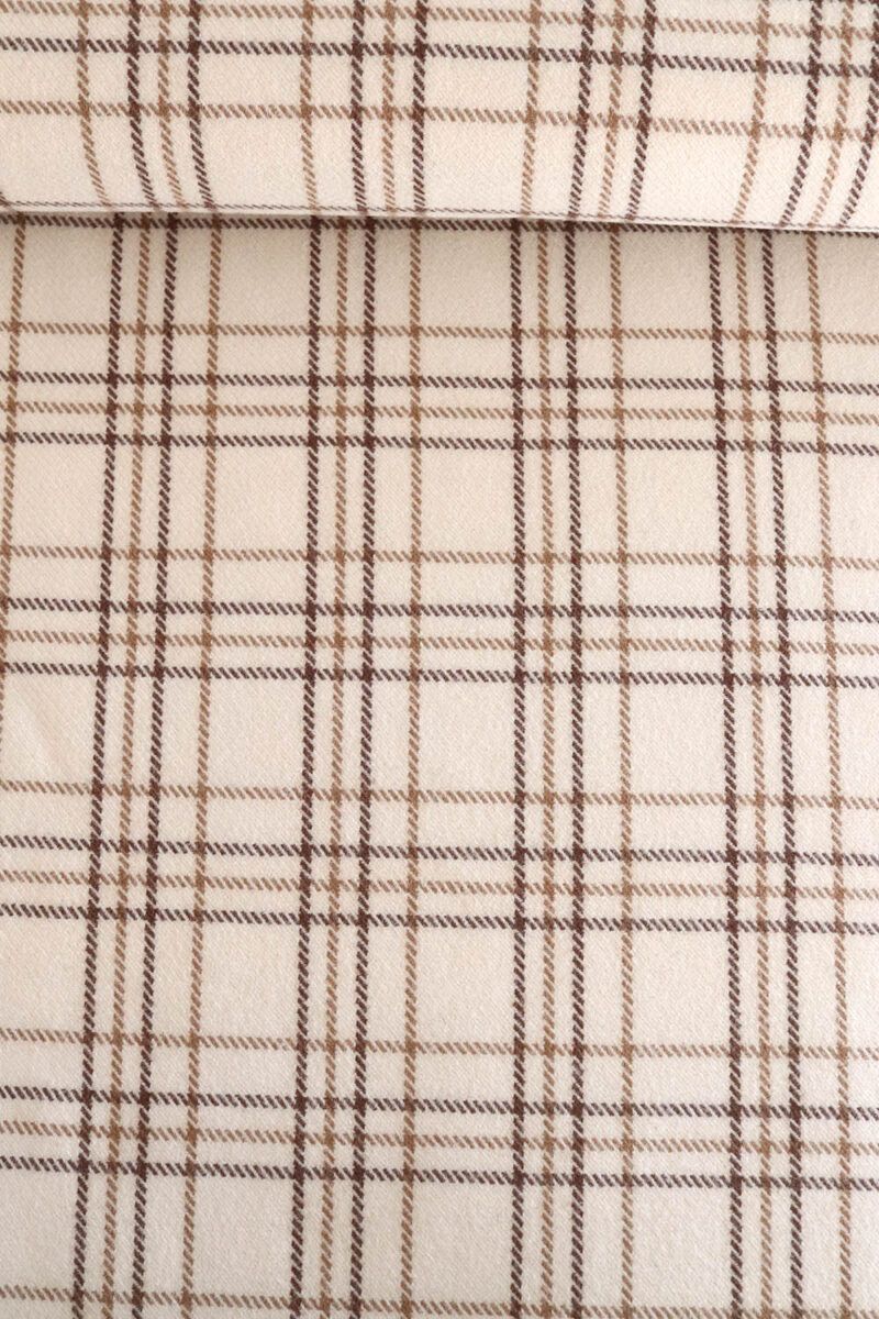 Tela de lana para abrigo con estampado a cuadros en dos tonos de marrón y con color de fondo crudo cremoso.