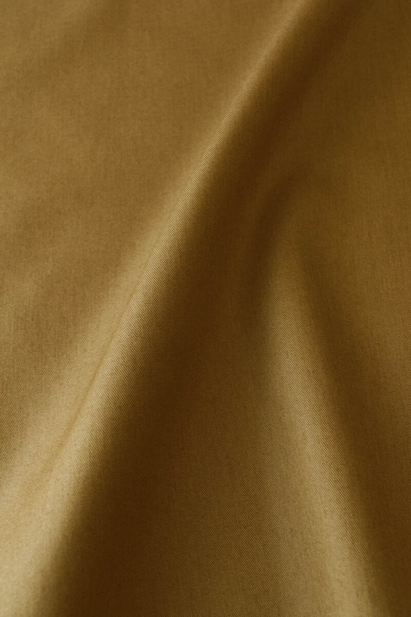 Tela de algodón de color ocre